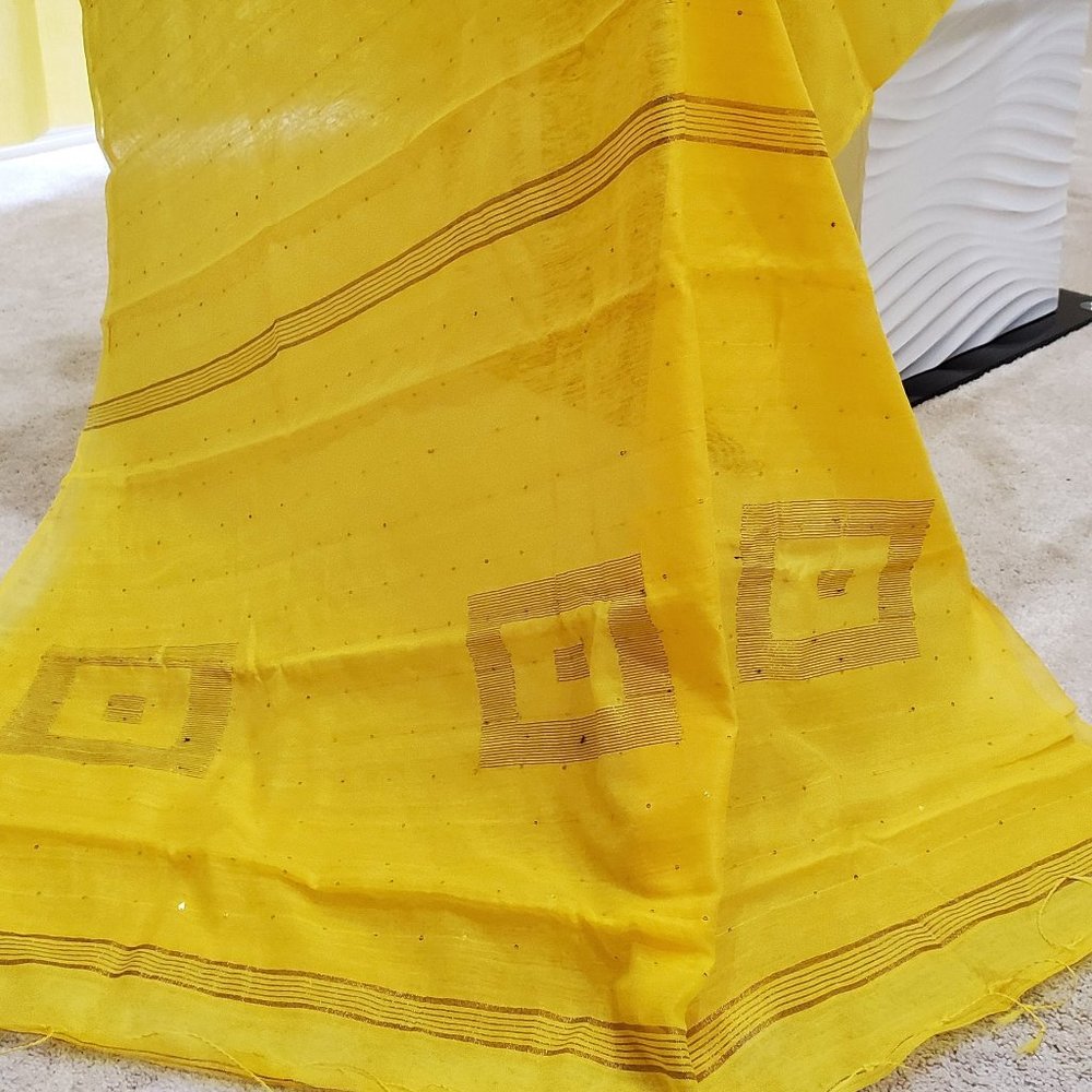 Yellow net sari wid gray blouse n yellow petticoat